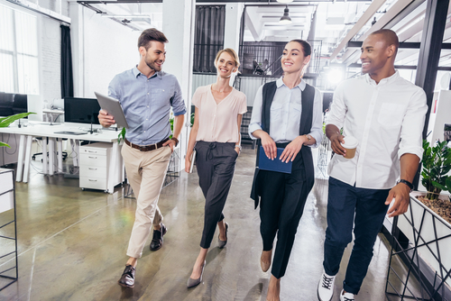 Walking in the Young businesspeople walking in the office