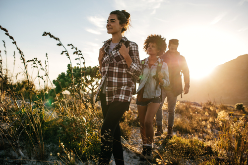 Friends hiking together in nature