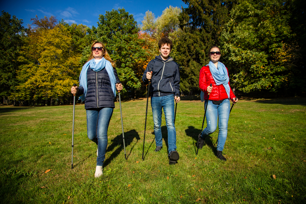 Walkers with walking poles in park