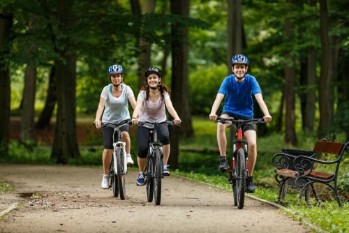 Friends biking in the park