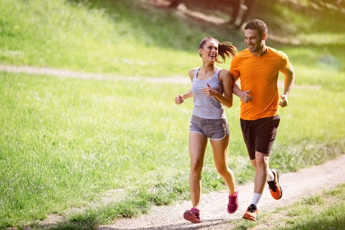 Couple walking or jogging for fitness