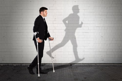 Businessman with injury wanting to walk more